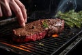 Cooking beef steak on grill pan by chef hands