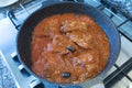 Prepating chicken chasseur in saucepan Royalty Free Stock Photo