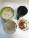 Cooking bread sourdough at home. On the table are the ingredients. Flour, honey and water Royalty Free Stock Photo