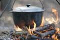 Cooking on campfire. Royalty Free Stock Photo
