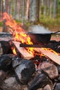Cooking at the campfire traditional dish Royalty Free Stock Photo