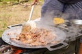 Cooking in a camping cast iron saj Royalty Free Stock Photo