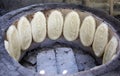 Cooking Caucasian Lavash in Tandoor Royalty Free Stock Photo