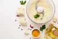 Cooking cauliflower rice closeup and ingredients on a white background Royalty Free Stock Photo