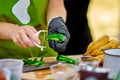 Cooking, Chef Cutting cucumber on hardboard and healthy food, Cutting cucumber slices on board with a sharp knife close Royalty Free Stock Photo