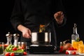 Cooking by the chef in the kitchen. Recipes and cooking, gastronomy. Culinary background. Italian pasta with ingredients