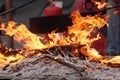 Cooking chestnuts on burning coals