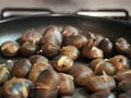 Cooking chestnuts on a pan