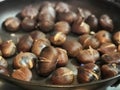 Cooking chestnuts on a pan