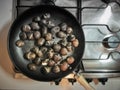 Cooking chestnuts on a pan