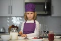 Cooking child. Chef kid cook baking at home kitchen. Royalty Free Stock Photo