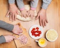 Cooking with children. Making pie at home. Children and mother h Royalty Free Stock Photo