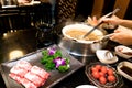 Cooking Chinese shabu with cherry tomato and yummy beef meat