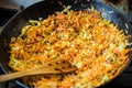 Cooking chongqing vegetables in wok at home