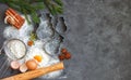 Cooking Christmas baking. Ingredients for the dough and the spices on the table. Flour, eggs, Cinnamon sticks, cardamom, star Royalty Free Stock Photo