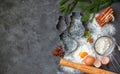 Cooking Christmas baking. Ingredients for the dough and the spices on the table. Flour, eggs, Cinnamon sticks, cardamom, star Royalty Free Stock Photo