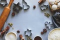 Cooking Christmas cookies. Ingredients for gingerbread dough: flour, eggs, sugar, cocoa, cinnamon sticks, anise stars Royalty Free Stock Photo