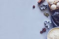 Cooking Christmas cookies. Ingredients for gingerbread dough: flour, eggs, sugar, cocoa, cinnamon sticks, anise stars Royalty Free Stock Photo