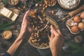 Cooking christmas fruit cake. Wooden table with baking ingredie