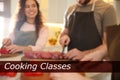 Cooking classes. Blurred view of people cutting meat and vegetables