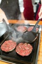 Cooking classes. Chef Grills meat patties