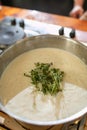 Cooking classes. Making bechamel sauce Royalty Free Stock Photo