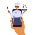 Human hand holding smartphone with young chef woman on screen preparing healthy food online Royalty Free Stock Photo