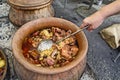 Cooking in a clay pot Royalty Free Stock Photo