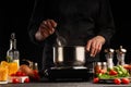 Cooking, the cook prepares pasta with vegetables, and sauce. Culinary and gastronomy