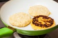 Cooking the corn bread on a pan Royalty Free Stock Photo