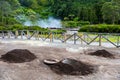 Cooking of Cozido Das Furnas meal, Sao Miguel, Azores. Hole in the ground for cooking Cozido das Furnas, a meat stew cooked by the