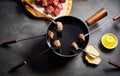 Cooking Cubes of Beef in Fondue Pot of Hot Oil Royalty Free Stock Photo