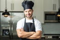 Cooking and culinary concept. Chef cook in uniform on kitchen. Male chef or cook baker man in apron cooking. Portrait of Royalty Free Stock Photo