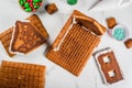 Cooking and decorating gingerbread house Royalty Free Stock Photo