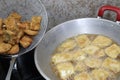 Cooking deep fried tempeh, Indonesian traditional meal, tempe goreng or gorengan