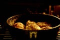 Frying chicken in a pan. Cooking potatoes Royalty Free Stock Photo