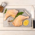 Cooking a dish of chicken meat on a cutting kitchen board made of artificial stone Royalty Free Stock Photo