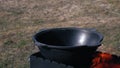 Cooking a dish - kazan kebob of Uzbek national cuisine in the process