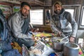 Cooking and eating view with indian drivers inside the truck