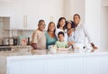 Cooking, family and portrait with grandparents in kitchen enjoying leisure together at Cancun home. Senior and young