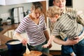 Cooking in family - stirring the sauce