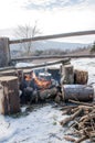 Cooking in field conditions, boiling pot at the campfire on picnic