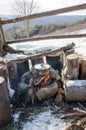 Cooking in field conditions, boiling pot at the campfire on picnic