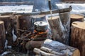 Cooking in field conditions, boiling pot at the campfire on picnic