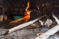 Cooking fire on floor on African Village hut. Royalty Free Stock Photo