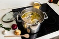 Cooking fish soup in pot Royalty Free Stock Photo