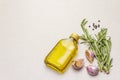 Cooking food background. Fresh rosemary, garlic clove, olive oil, black pepper Royalty Free Stock Photo