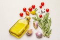 Cooking food background. Fresh rosemary, garlic clove, olive oil, black pepper Royalty Free Stock Photo