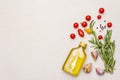 Cooking food background. Fresh rosemary, garlic clove, olive oil, black pepper Royalty Free Stock Photo