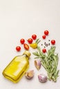 Cooking food background. Fresh rosemary, garlic clove, olive oil, black pepper Royalty Free Stock Photo